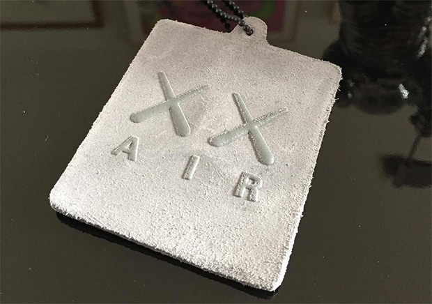 KAWS Teases Jordan Brand Collaboration With Suede Hangtag