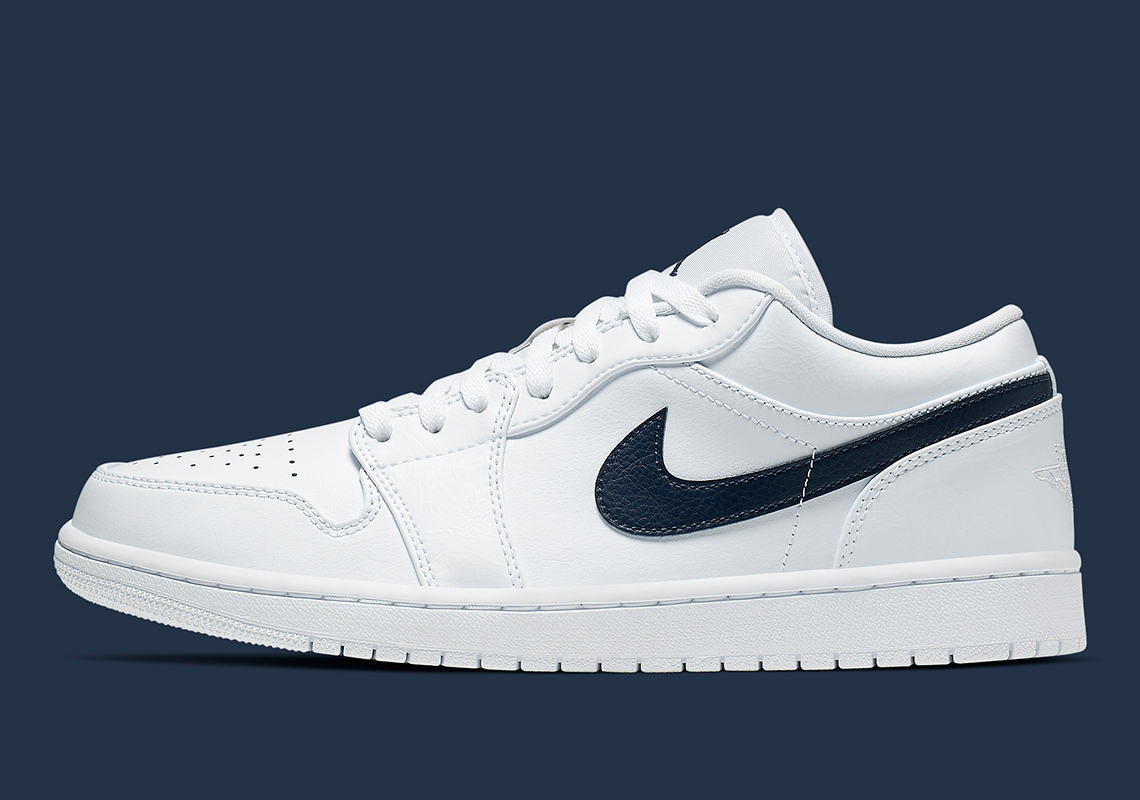 The Air Jordan 1 Low Arrives In A Crisp White And Navy