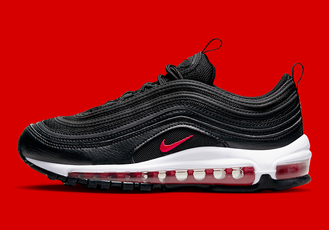 Classic "Black/Red" Styling Lands On This Kid's Nike Air Max Plus