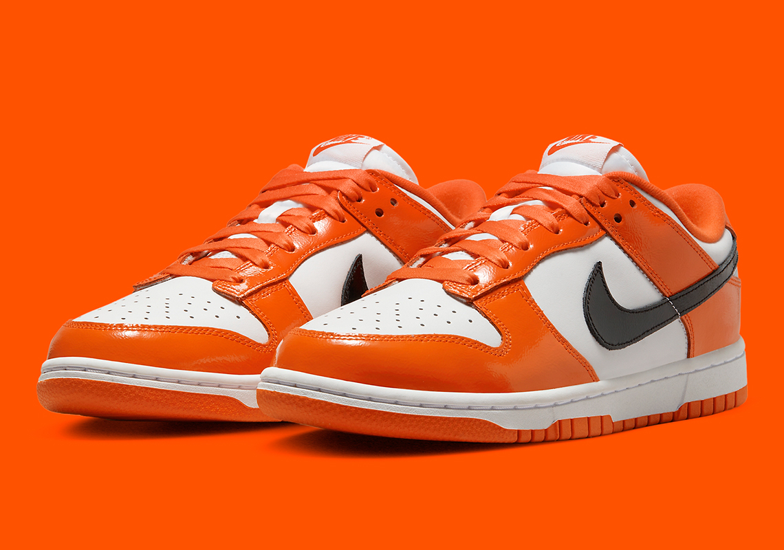 The Nike Dunk Low "Halloween" Dresses Up In Glossy Orange And Black