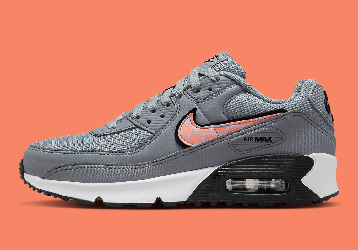 Orange-Colored "NIKE" Branding Animates This Greyscale Air Max 90
