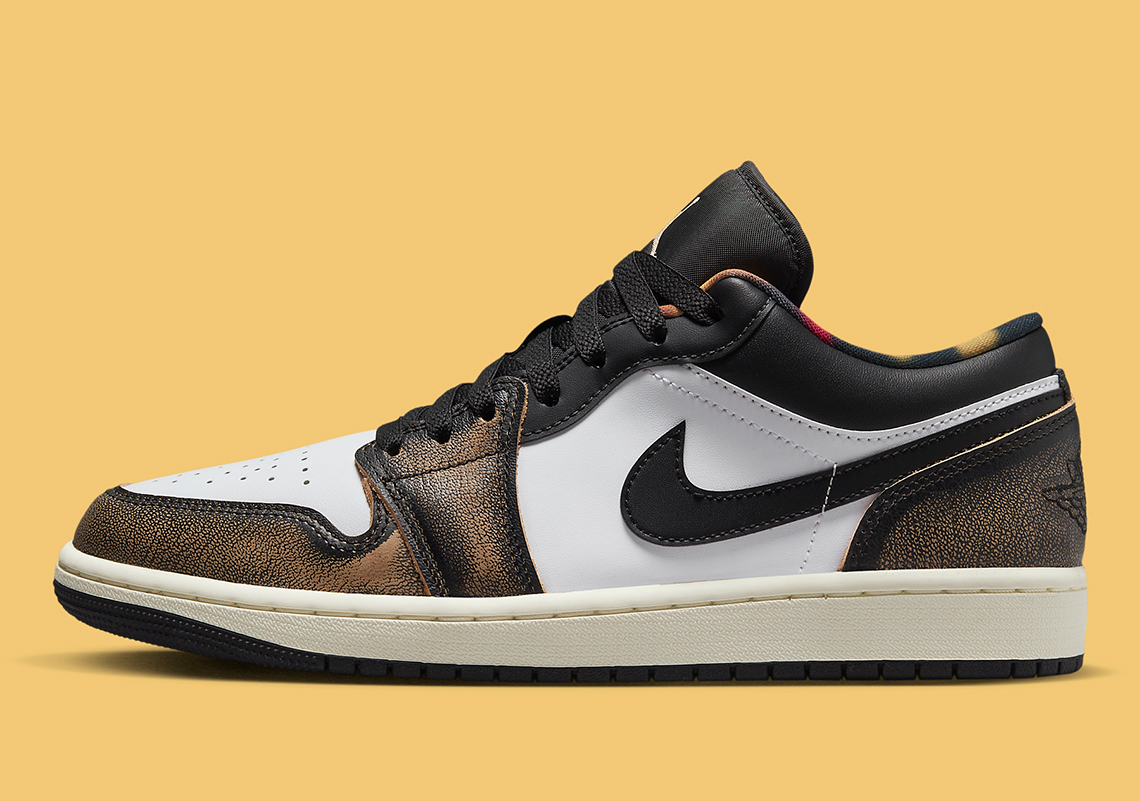 Hints Of Yellow Poke Through On The Latest Air Jordan 1 Low "Wear-Away"