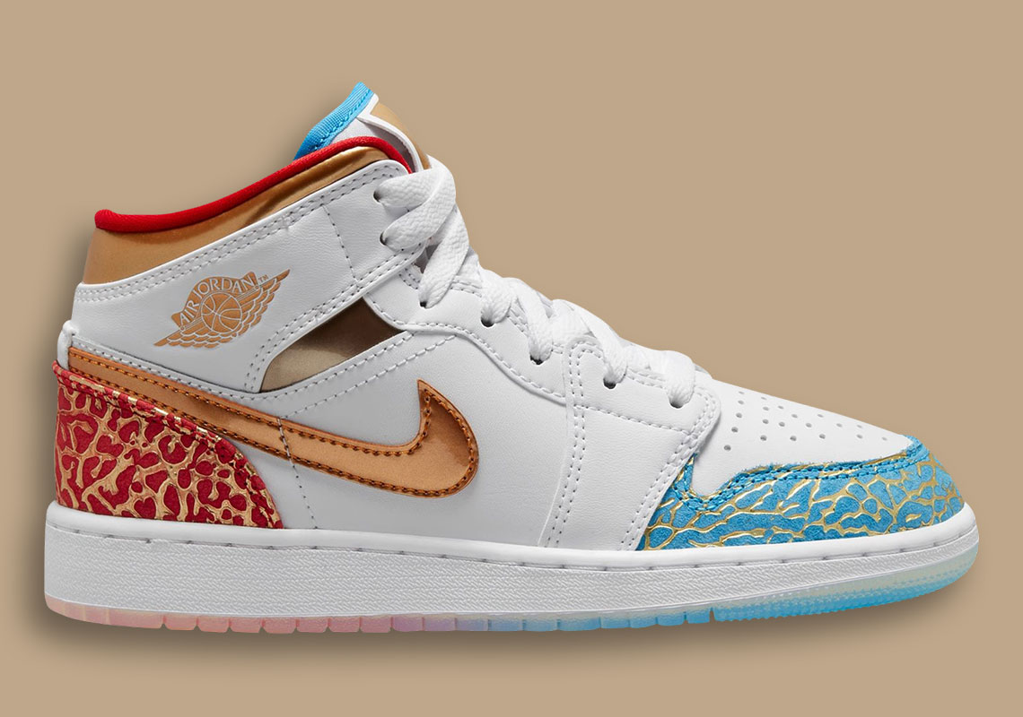 Golden Metallic Accents Coat The GS Air Jordan 1 Mid "UNC To Chicago"
