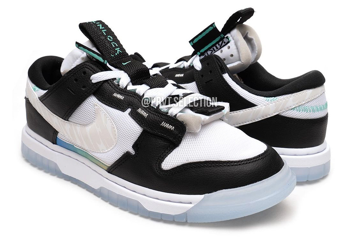 The Nike Dunk Low Remastered Dawns A Turquoise Accented Panda Scheme