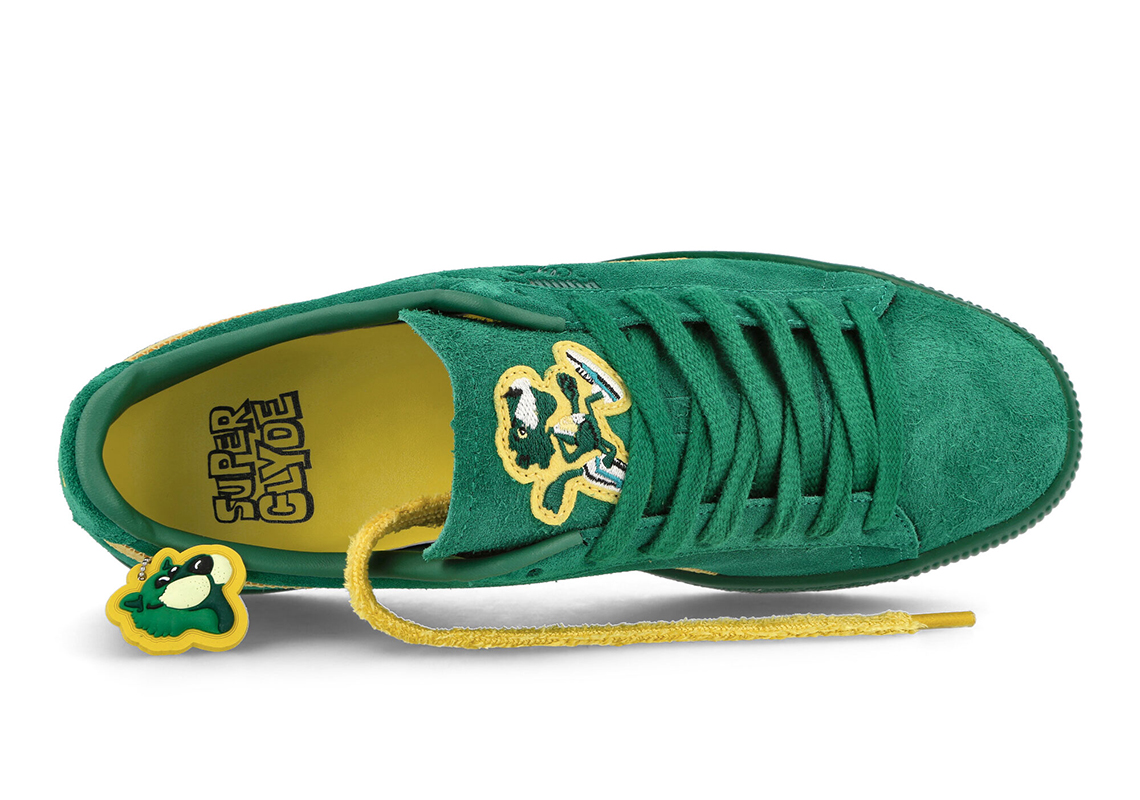 The PUMA Super Clyde Contrasts Its Clad "Evergreen" Upper With "Sun Ray Yellow"