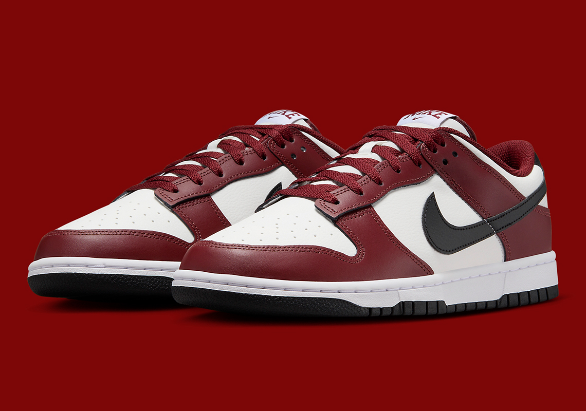 "Dark Team Red" Prepares A Varsity Style Nike Dunk Low